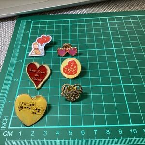 Hearts shaped pins lot as it